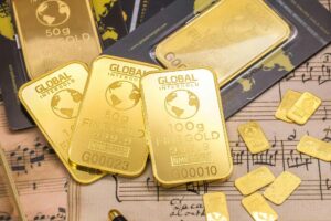 Gold is tempting as an investment because of its capacity to remain strong during difficult economic times and hedge against inflationary losses in the value of fiat currencies. This image shows gold bars and is related to an article on Gold Trading.